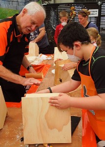 A guided hand sanding